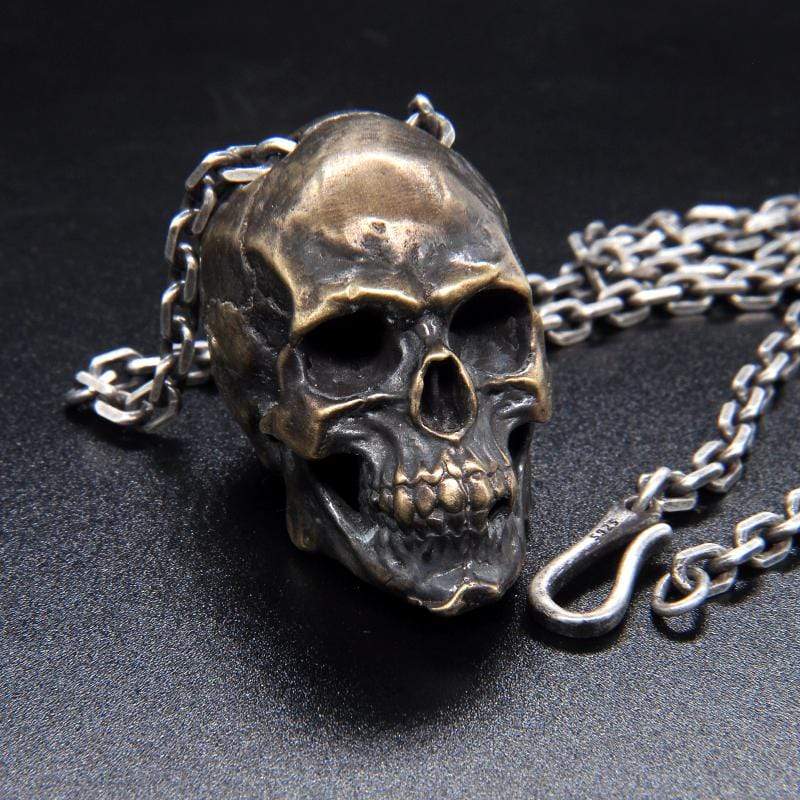 OVERPOWERING SKULL BRASS PENDANT