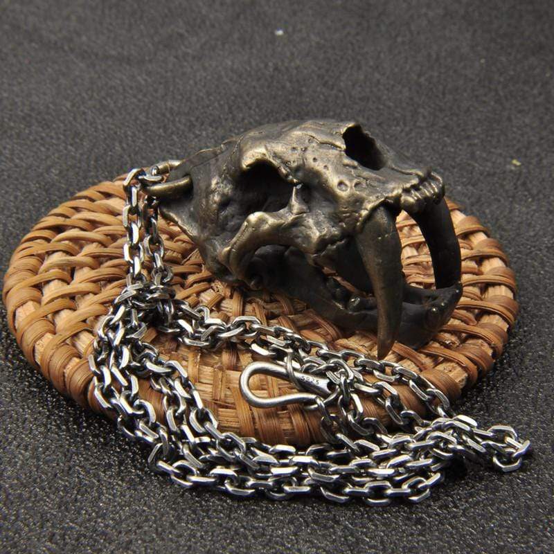 SABER-TOOTHED TIGER SKULL BRASS PENDANT